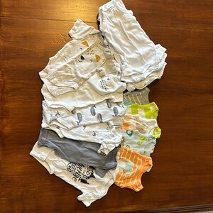 Lot of 16 used Newborn bodysuits